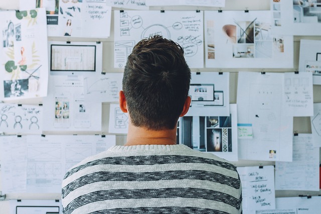 A man compares the best way to market his locally optimised SEO content in Perth. best ppc management companies